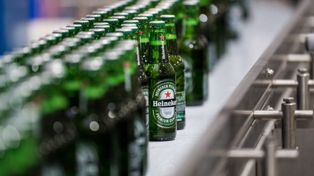 Heineken shares climb as brewer announces strong profits and buyback